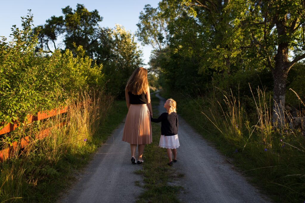 A mother and daughter taking a walk and talking about diabetes