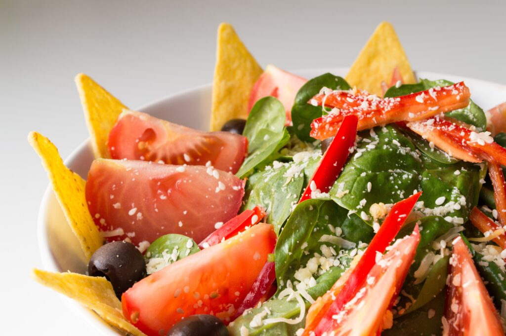 A tomato and spinach salad.