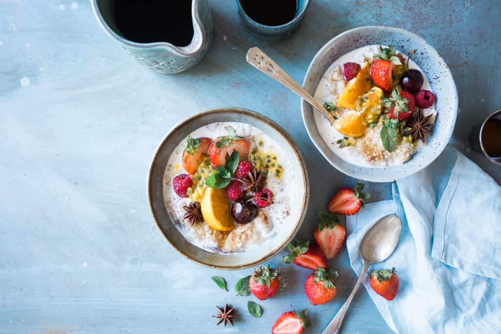 Bowl of fruit and oatmealvegetable salad 