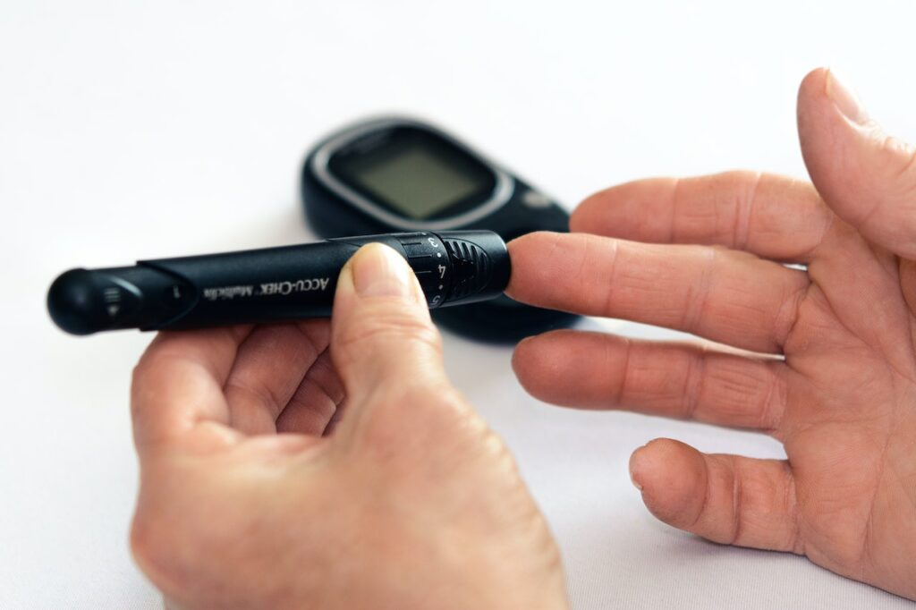 A person checking their blood sugar.